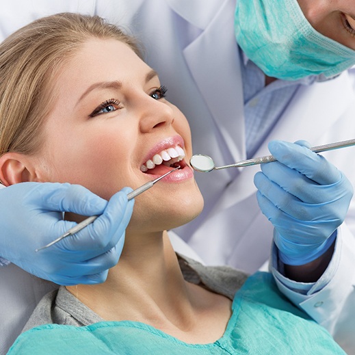 patient receiving dental crowns in Garland