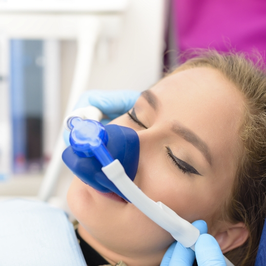 Relaxed patient receiving nitrous oxide sedation dentistry